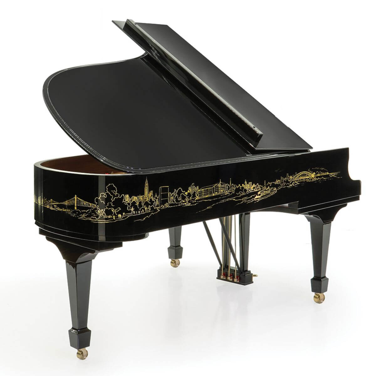 side shot of piano showing the skyline design artwork