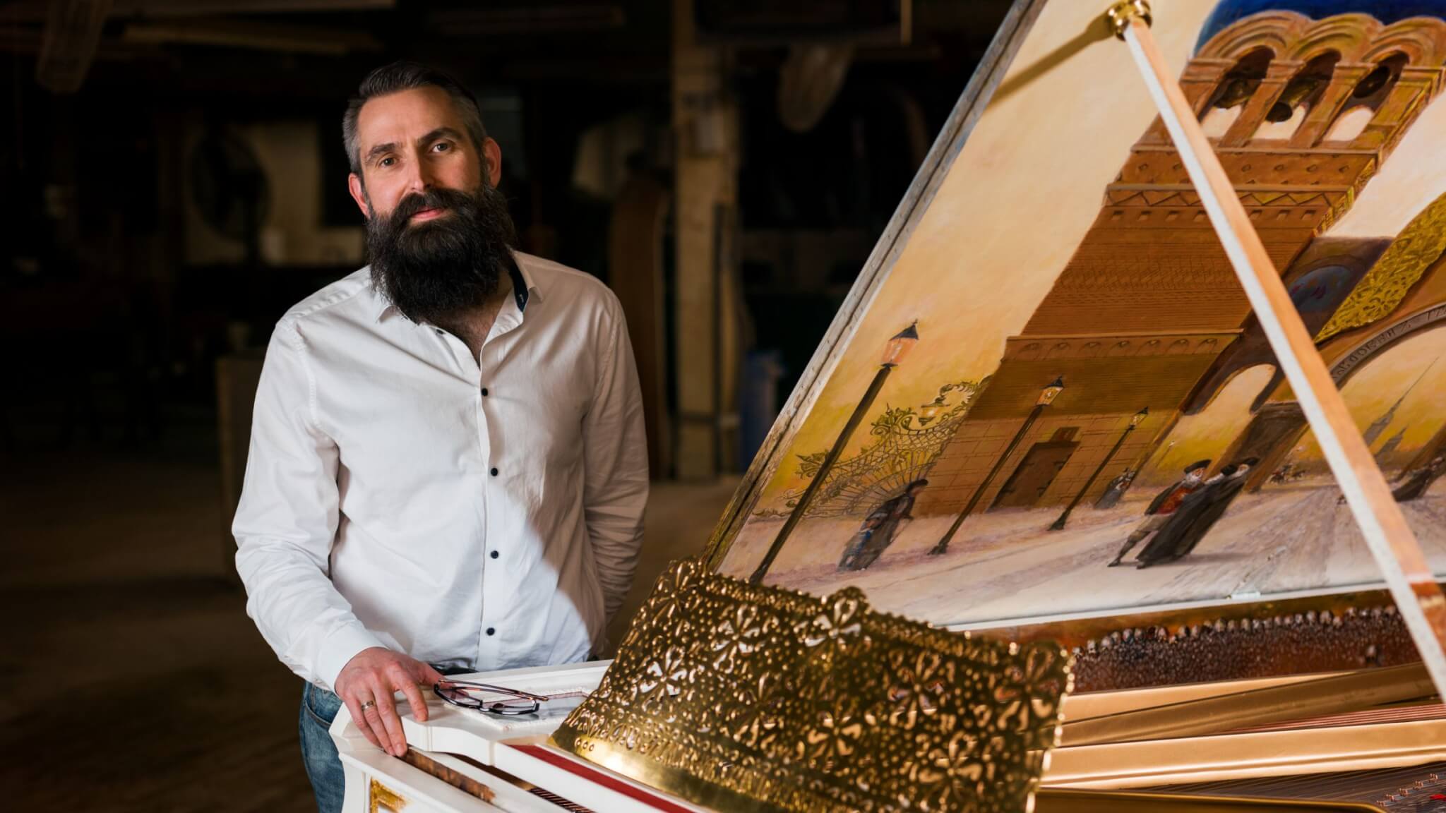 Paul Wyse standing in front of Steinway piano