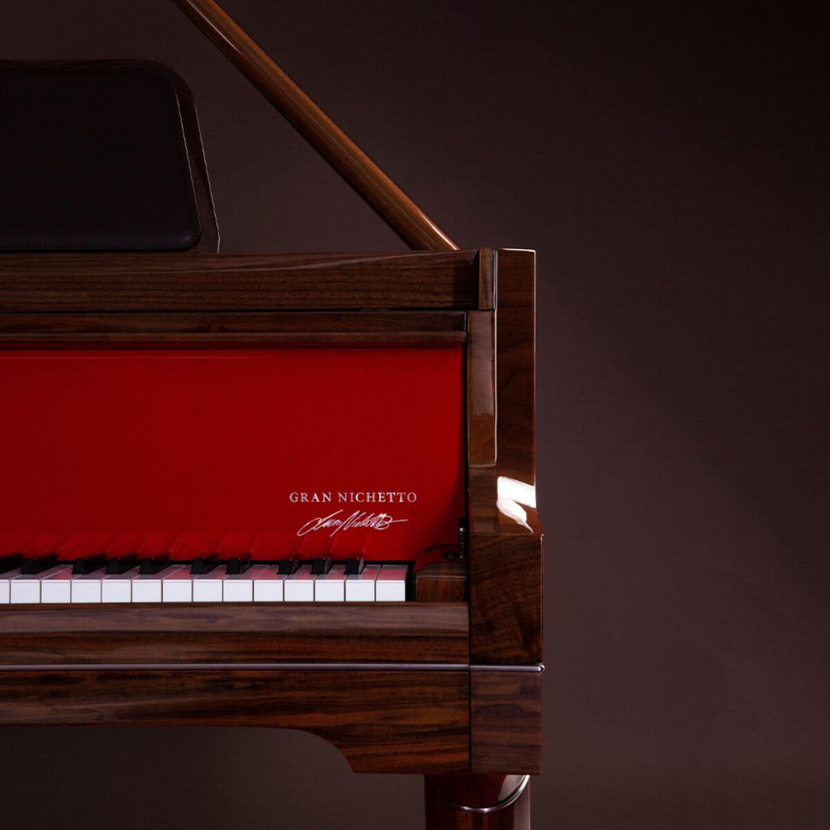 closeup view of piano keys of the Gran Nichetto Model B — The Walnut Veneer
